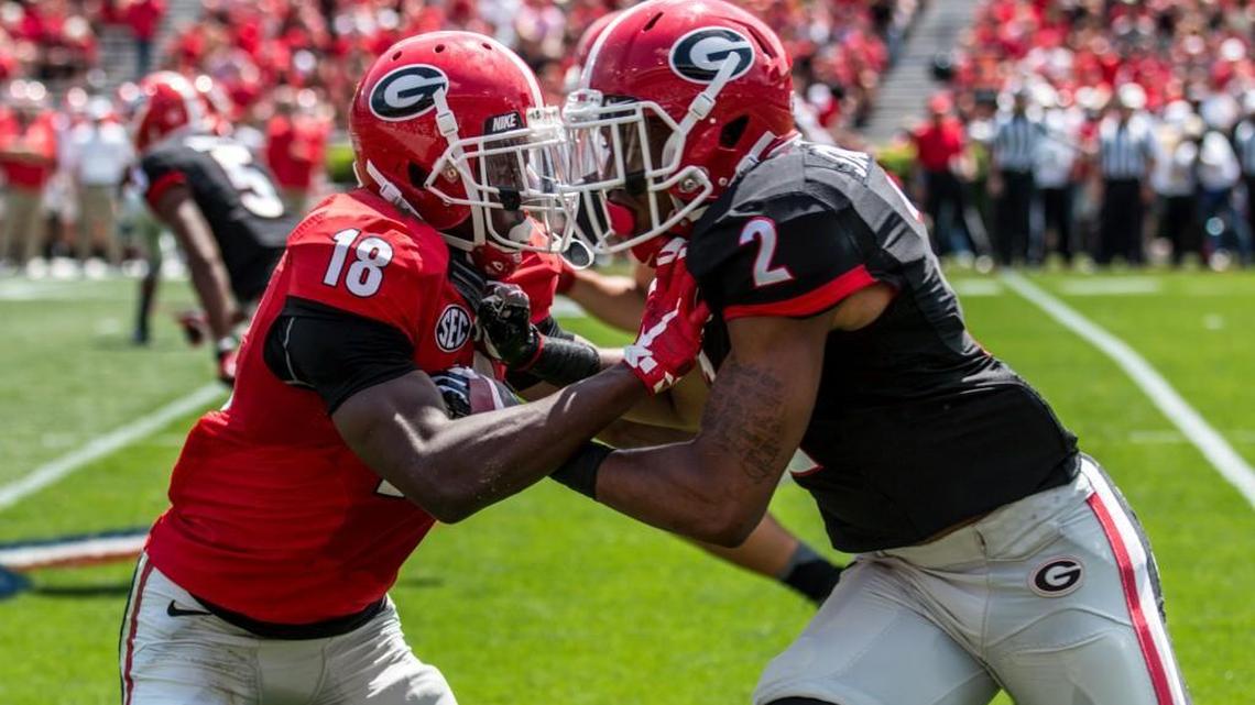 Georgia cornerback Deandre Baker (18) and wide receiver Jayson Stanley (2) during G-Day at Sanford Stadium.
