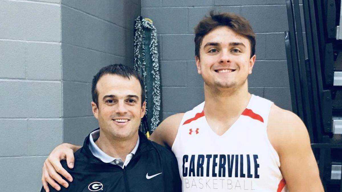 Georgia recruit Luke Ford with tight ends coach Shane Beamer.