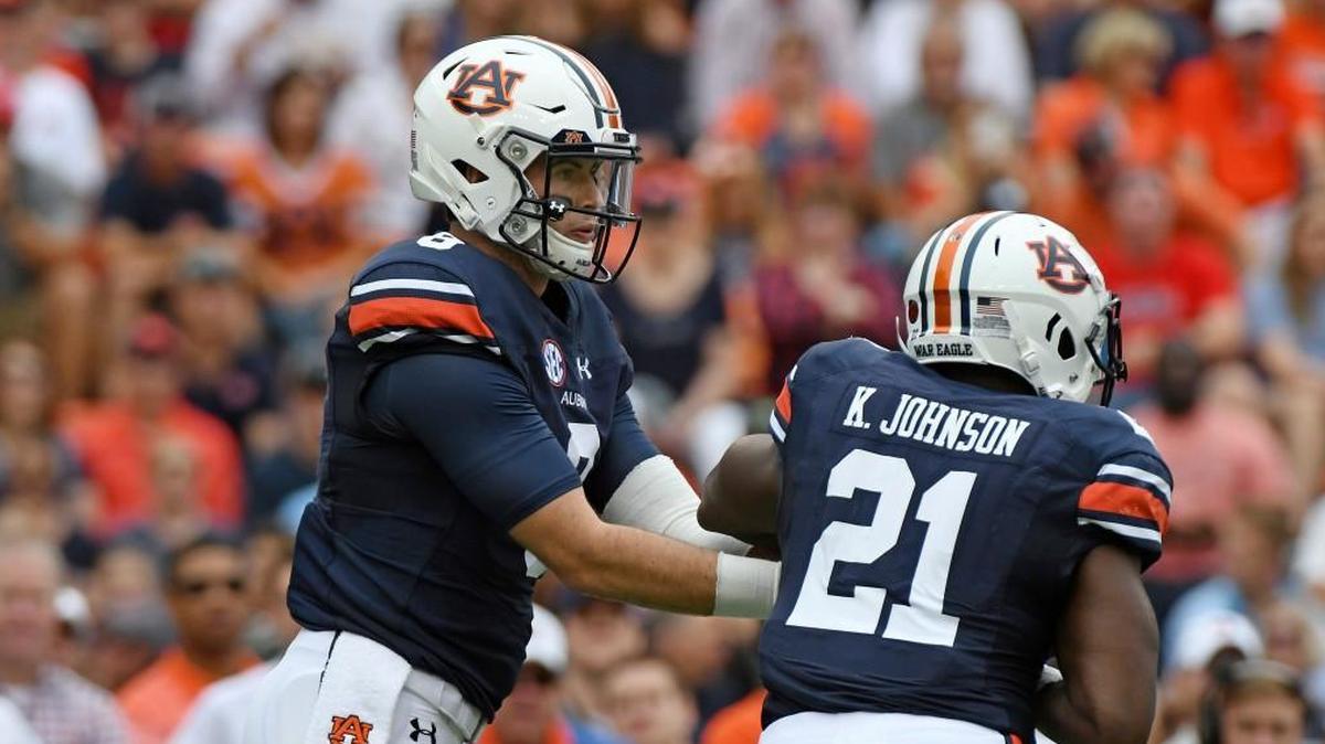 Auburn quarterback Jarrett Stidham (8) and running back Kerryon Johnson (21) offer the offense plenty of balance for defenses to deal with.