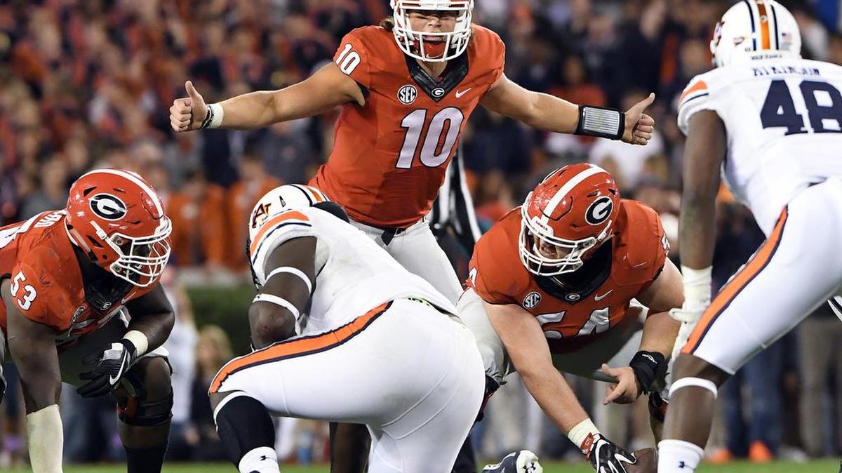 Georgia quarterback Jacob Eason makes a check at the line of scrimmage against Auburn.