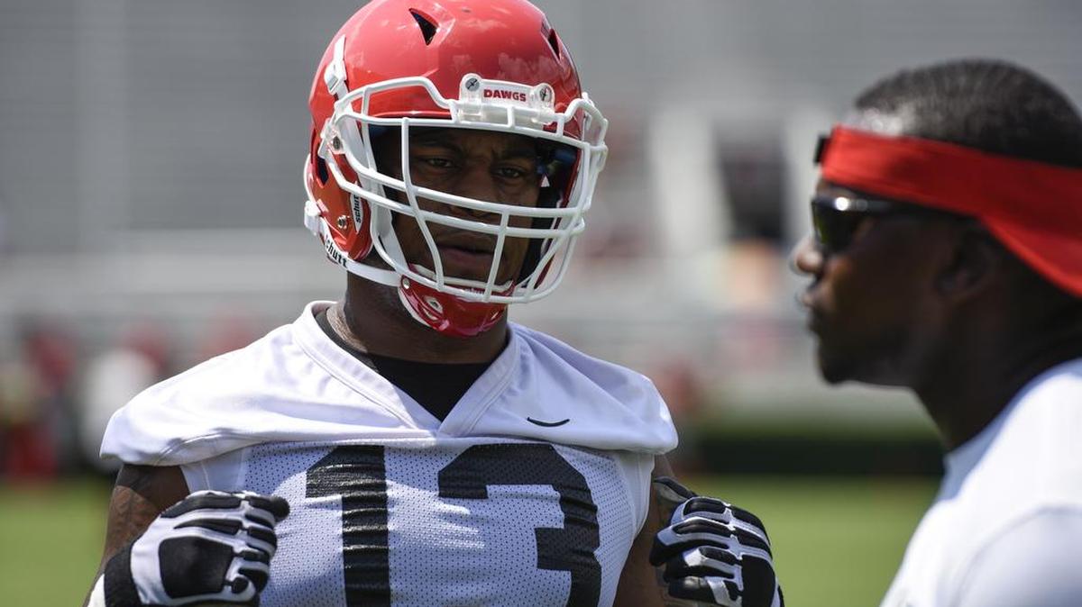 Georgia defensive lineman Jonathan Ledbetter (13) practices a drill during Fan Day in 2016.