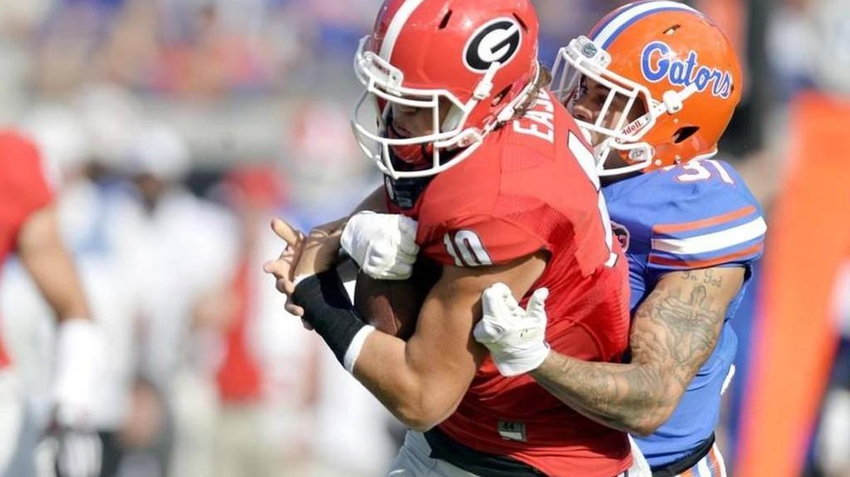 Jacob Eason is sacked during Georgia’s 24-10 loss to Florida.