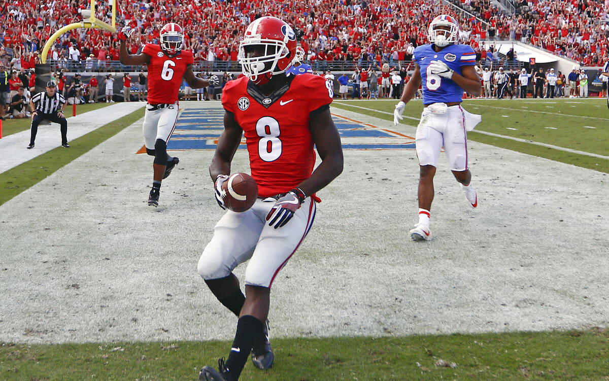 Riley Ridley catches a touchdown against Florida. 