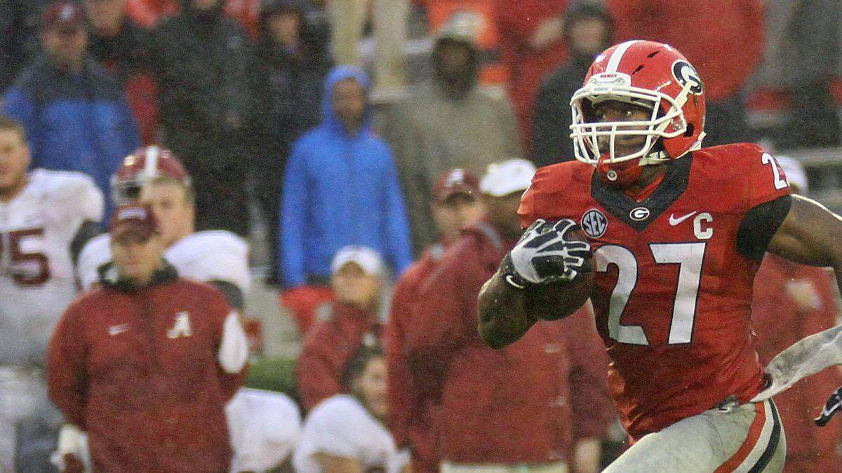 Nick Chubb runs for a long touchdown against Alabama. 