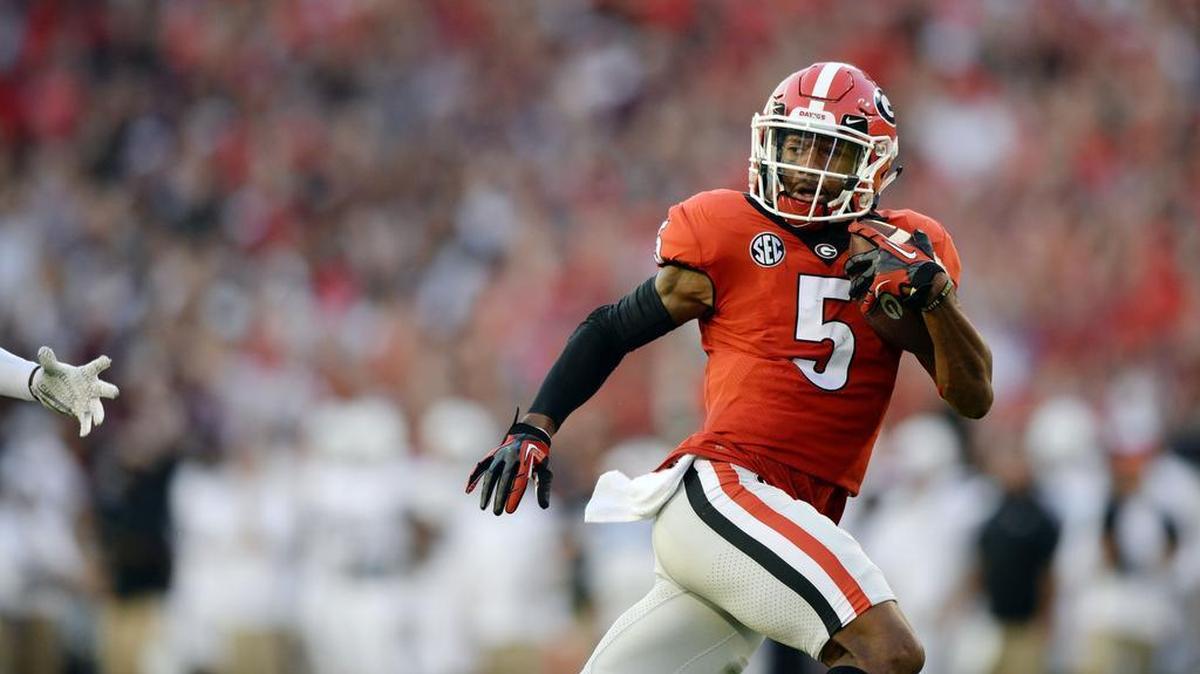 Georgia receiver Terry Godwin looks back as he heads to the end zone with a Jake Fromm bomb for the first score of the Bulldogs' game against Mississippi State.