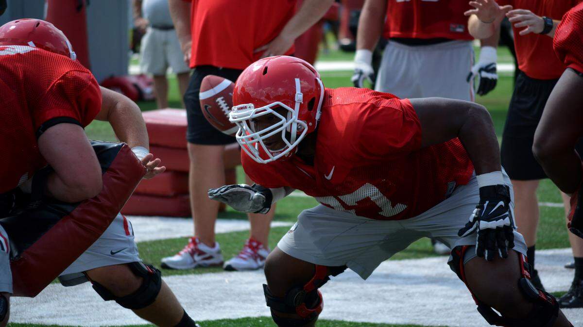 Isaiah Wynn goes through a drill during a past practice. 