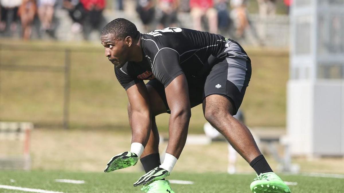 Linebacker Jordan Jenkins works during a drill in front of NFL football scouts during Georgia's Pro Day.