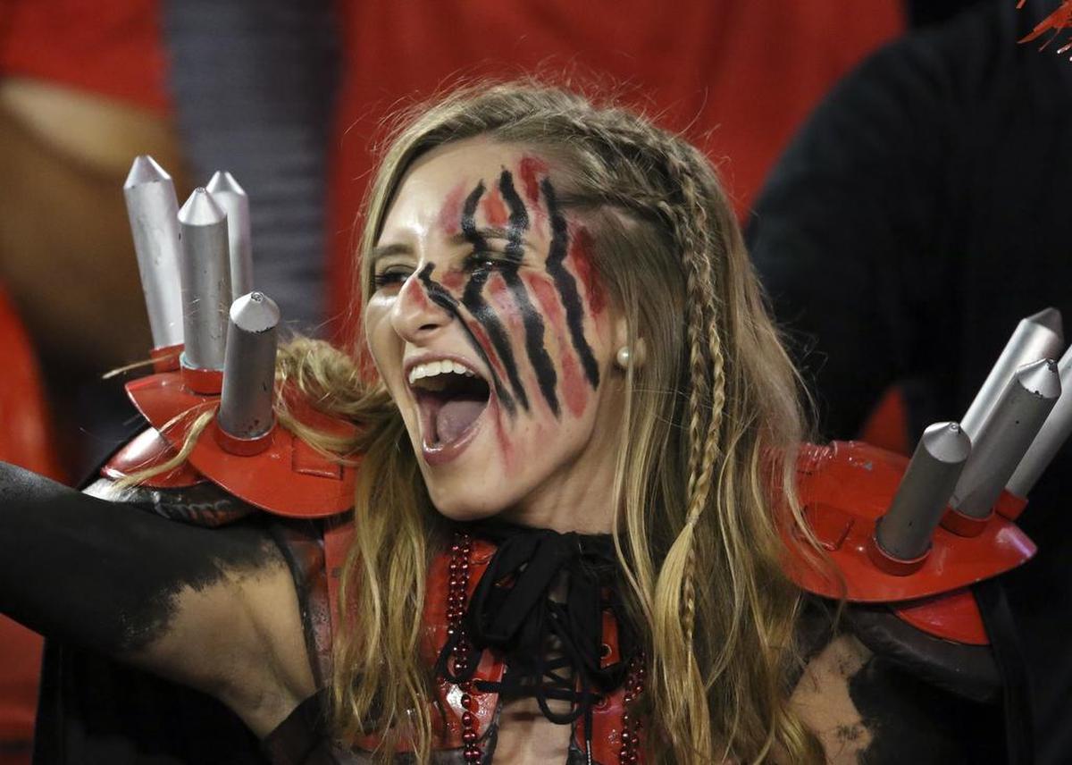A Georgia fans yells as the Bulldogs take the field before an NCAA college football game against the Missouri Saturday, Oct. 14, 2017, in Athens,Ga.