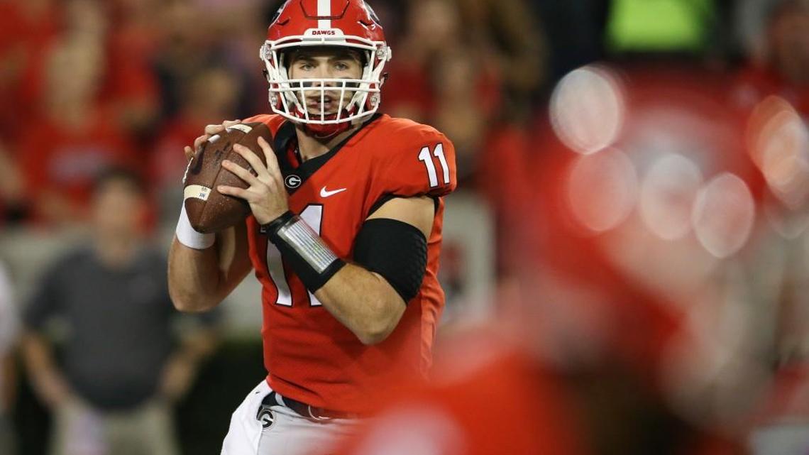 Georgia quarterback Jake Fromm (11) throws from the pocket against Missouri.
