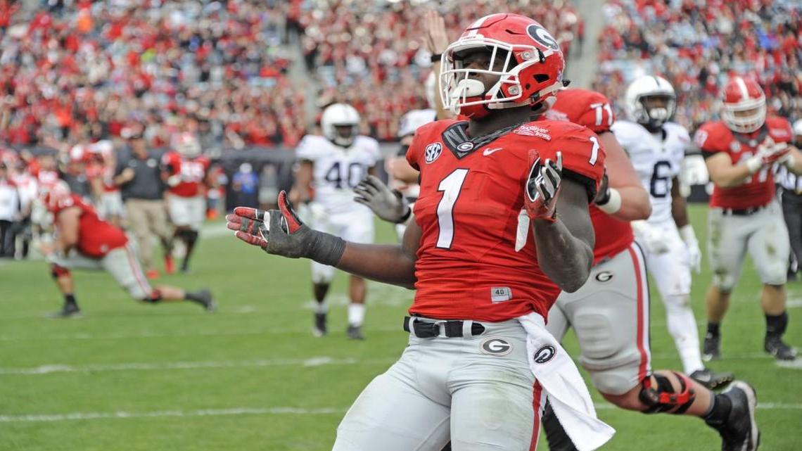 Sony Michel after scoring a touchdown in the TaxSlayer Bowl.