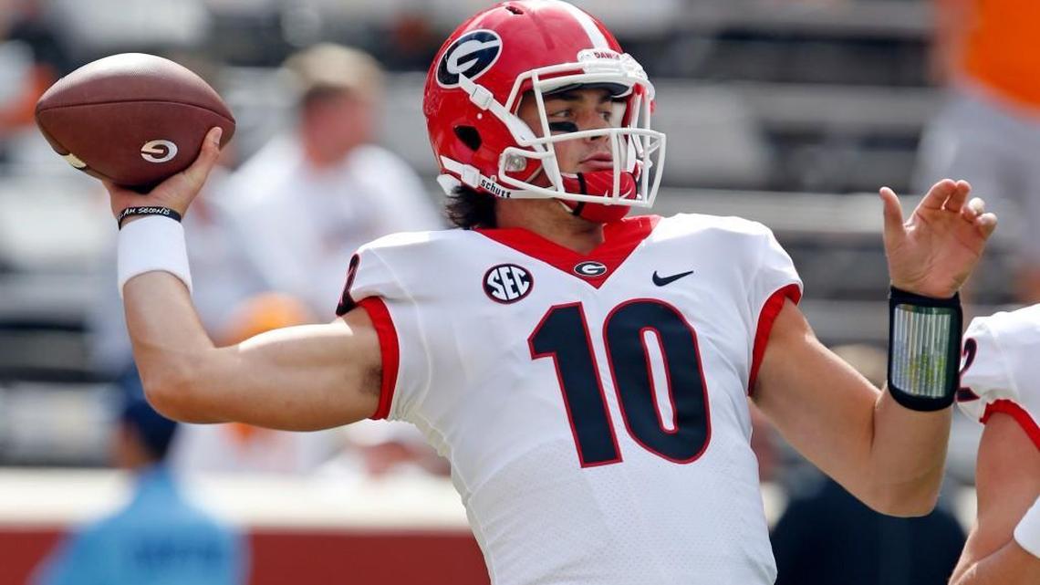 Georgia quarterback Jacob Eason (10) warms up before an NCAA college football game against Tennessee.