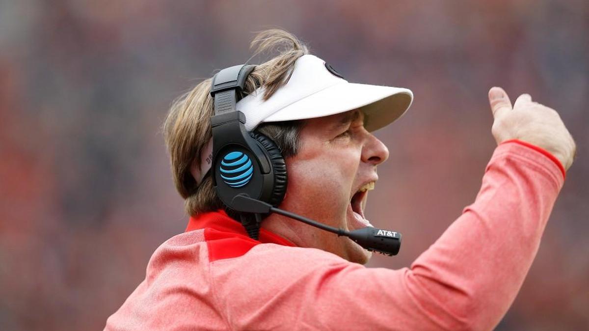 Georgia coach Kirby Smart yells to his players during the first half of an NCAA college football game against Auburn.
