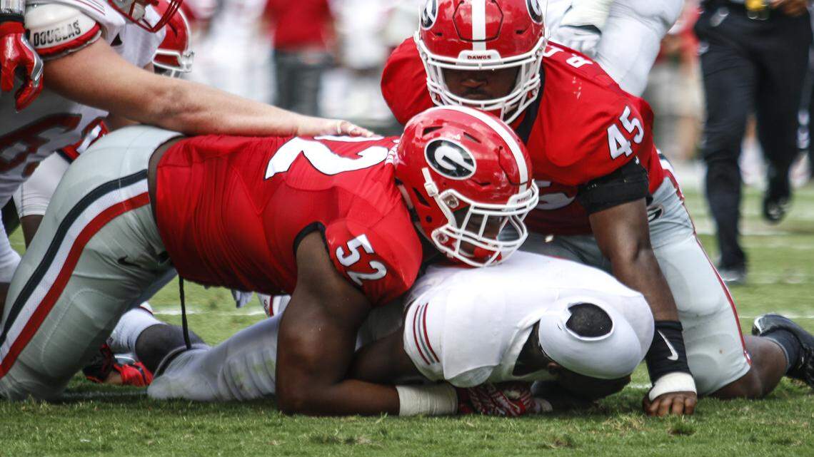 Georgia defensive lineman Tyler Clark records a tackle against Nicholls State. 