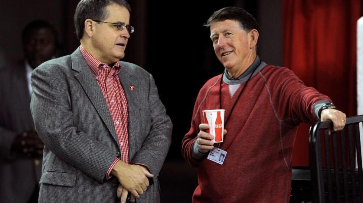President Jere Morehead and Athletic Director Greg McGarity during a UGA basketball game in 2015.