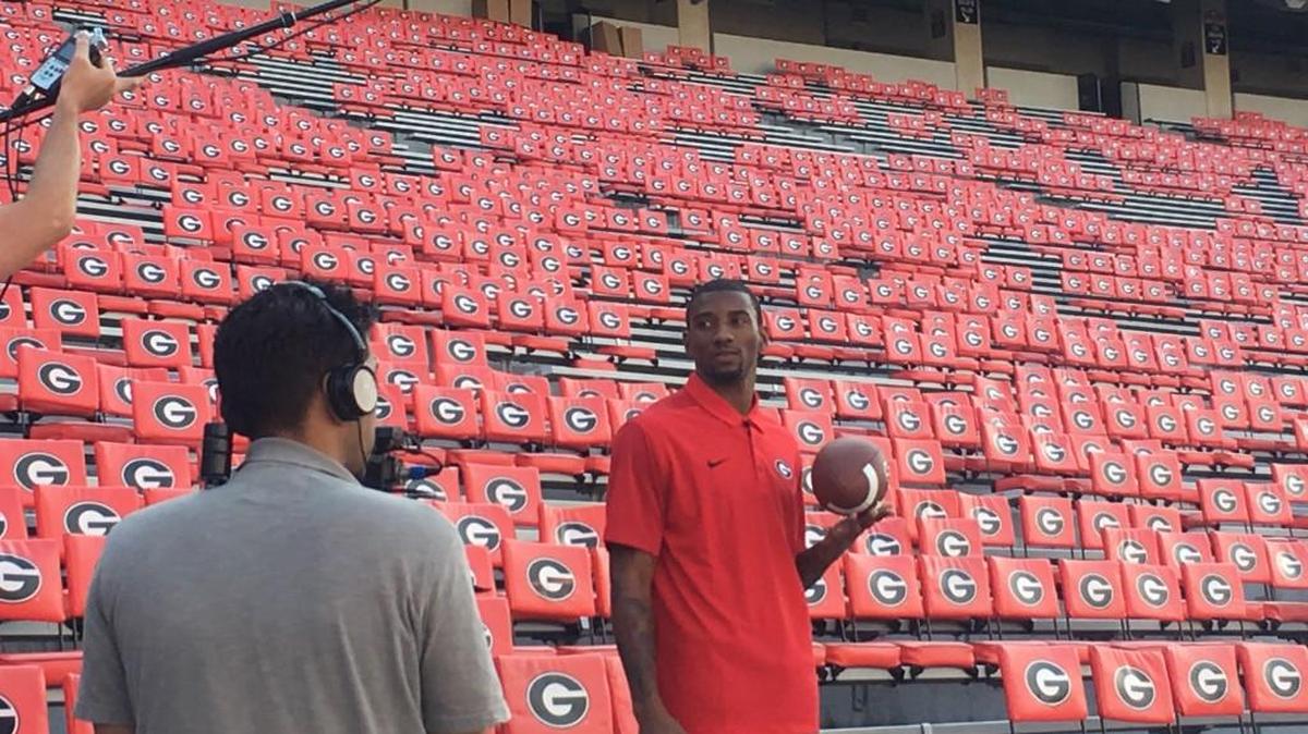 Malcolm Mitchell prepares for a shoot with CampusLore at Sanford Stadium.