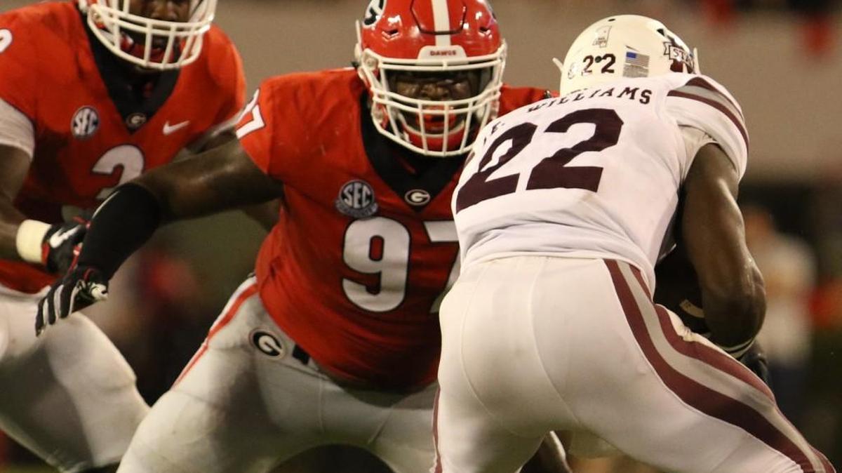 Georgia nose tackle John Atkins (97) has helped the defense be quite stout against the run.