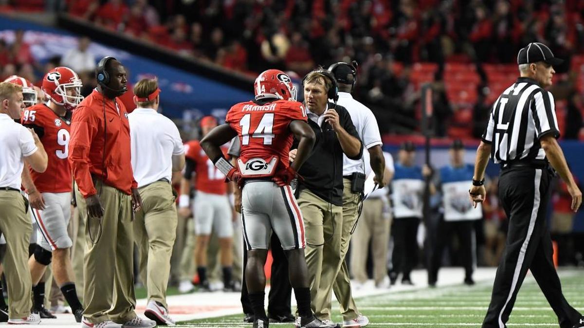 Georgia head coach Kirby Smart speaks with cornerback Malkom Parrish during last Saturday’s win over North Carolina.