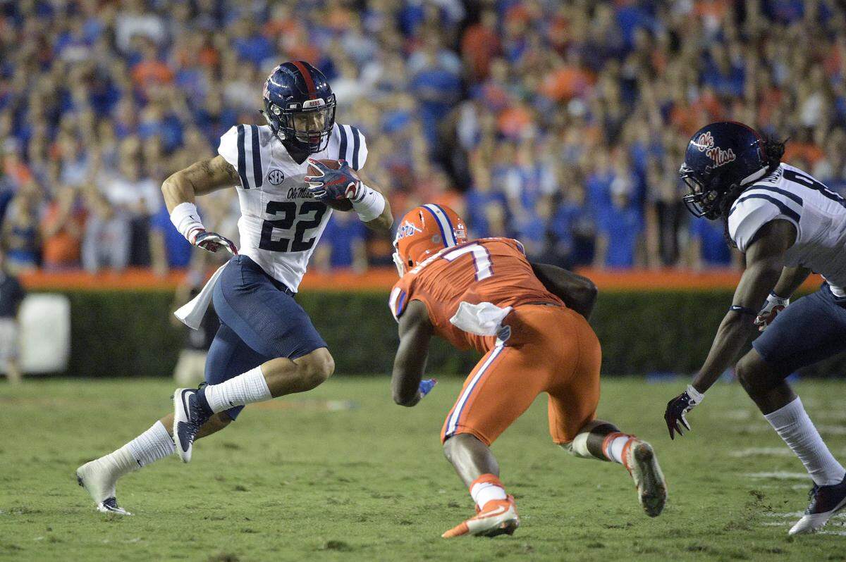Duke Dawson looks to make a tackle. 