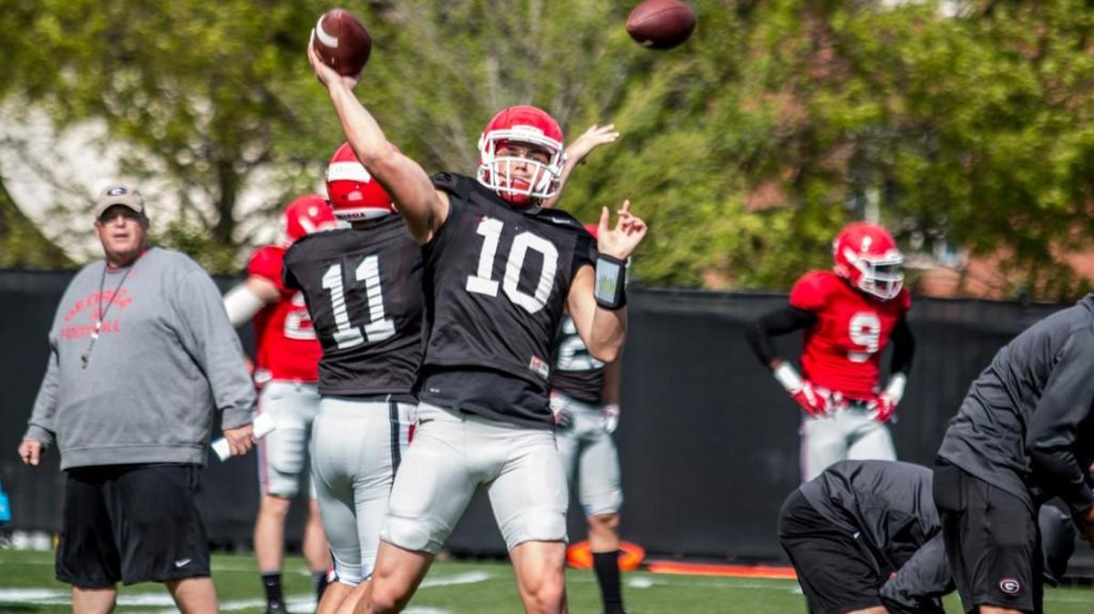 Georgia quarterback Jacob Eason attempts a pass during Thursday’s practice.