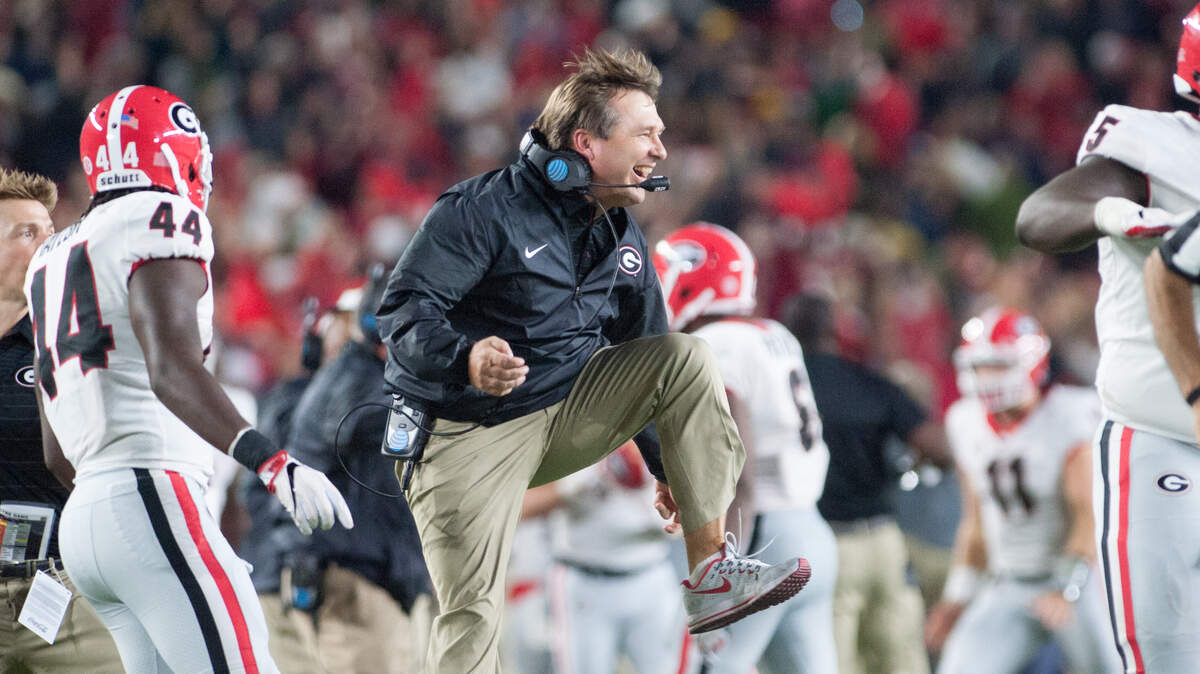 Kirby Smart is quite happy in this photo. 