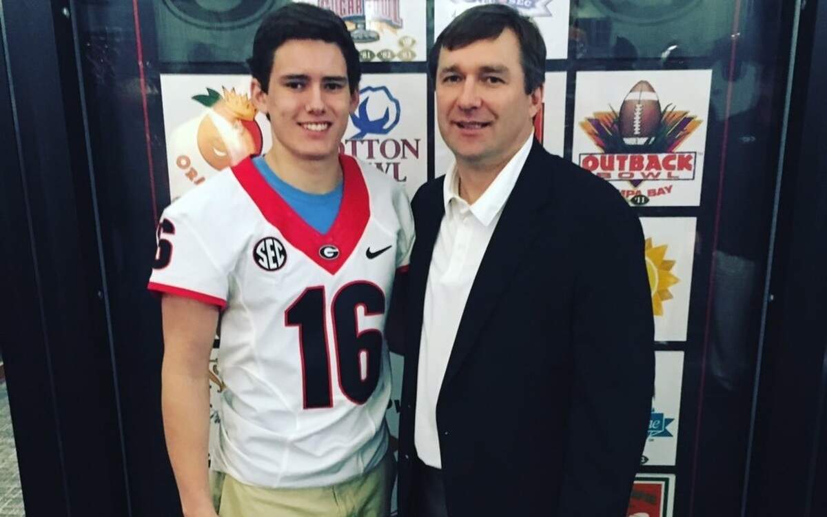 Mitchell Wasson poses for a photo with Kirby Smart. 