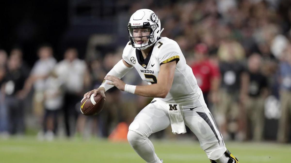 Missouri quarterback Drew Lock (3) scrambles against Purdue during the first half of their game Sept. 15 in West Lafayette, Ind.