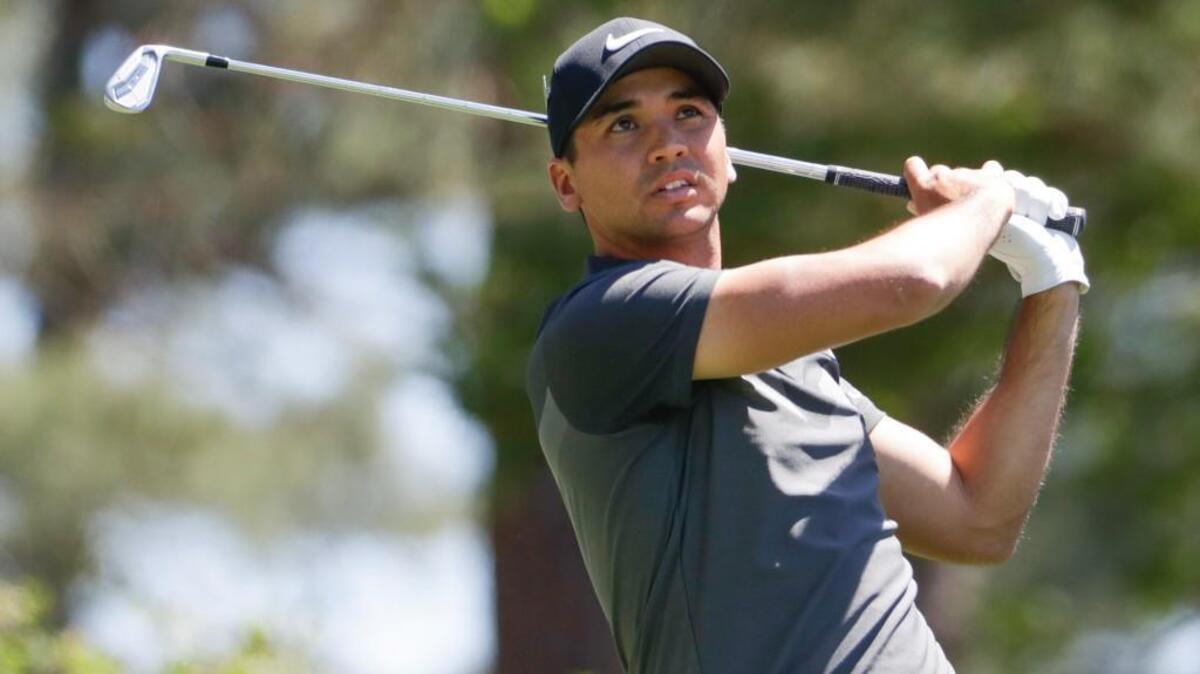 Jason Day hits a tee shot on the fourth hole during the final round of the Masters.
