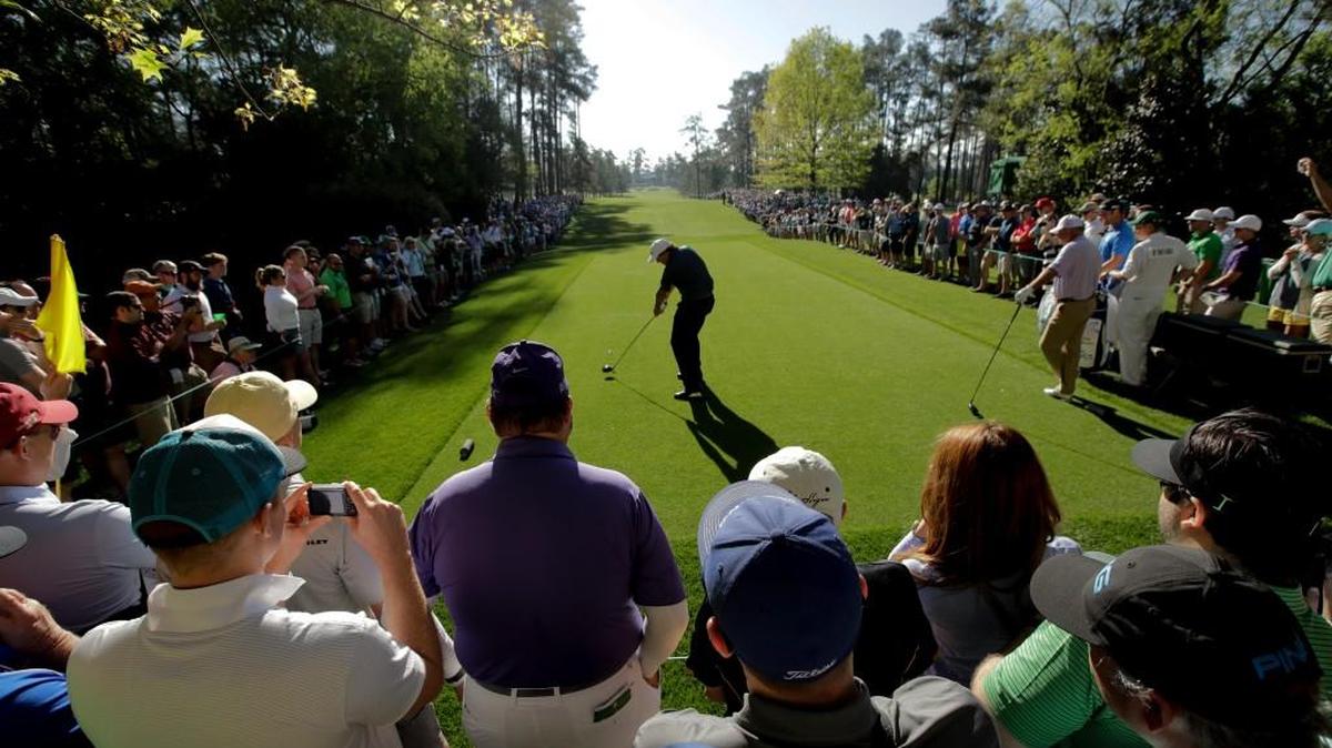 Phil Mickelson hits his tee shot on the seventh hole during a practice round at the Masters.