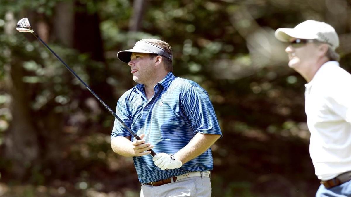Stan Gann Jr. tees off on the 17th hole at Healy Point Country Club during the final round of the Macon-Middle Georgia Championship on Sunday. Gann won the event for the fifth straight year.