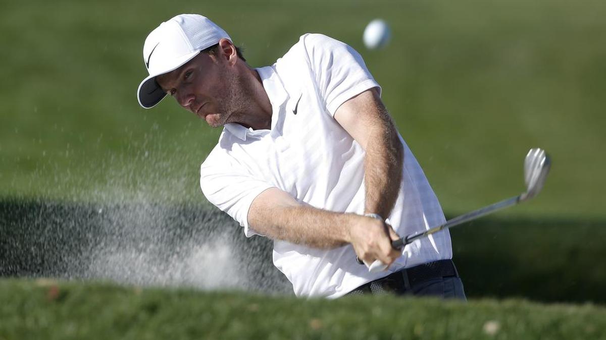 Russell Henley hits a shot at the Honda Classic in Palm Beach Gardens, Florida.