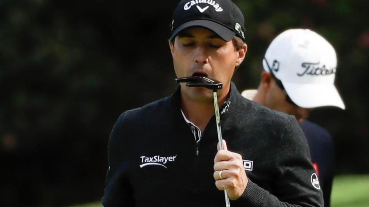 Kevin Kisner reacts after missing a putt on the 13th hole during the second round of the Masters.