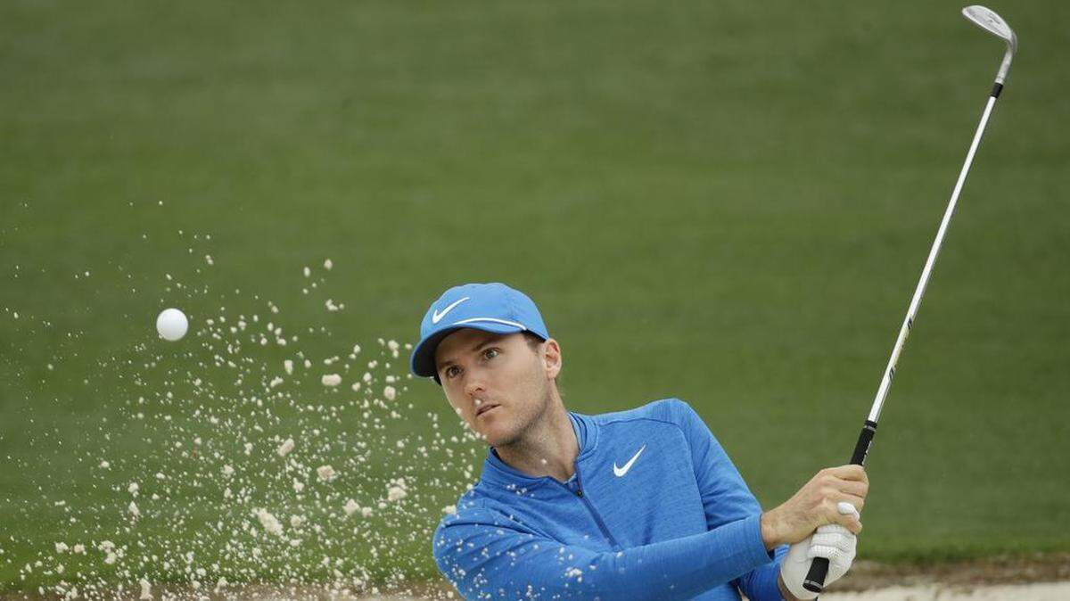 Russell Henley hits from a bunker on the second hole during the third round at the Masters golf tournament April 8, 2018.