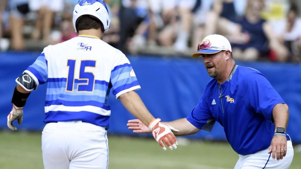 Tattnall Square’s Trey Ham (15) gets congratulated by head coach Joey Hiller after hitting a solo home run in an 11-1 win over Mount de Sales on Saturday.