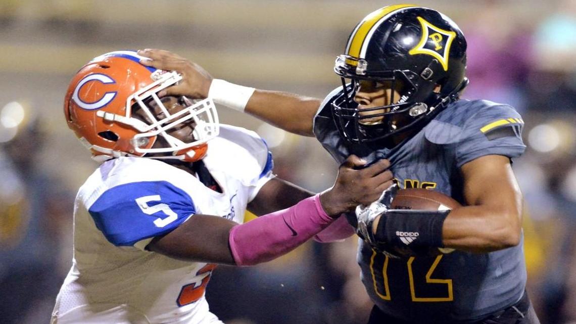Peach County quarterback Antonio Gilbert (12) is a player Greater Atlanta Christian has its eye on after he scored two rushing and two passing touchdowns last week against Westminster-Atlanta.