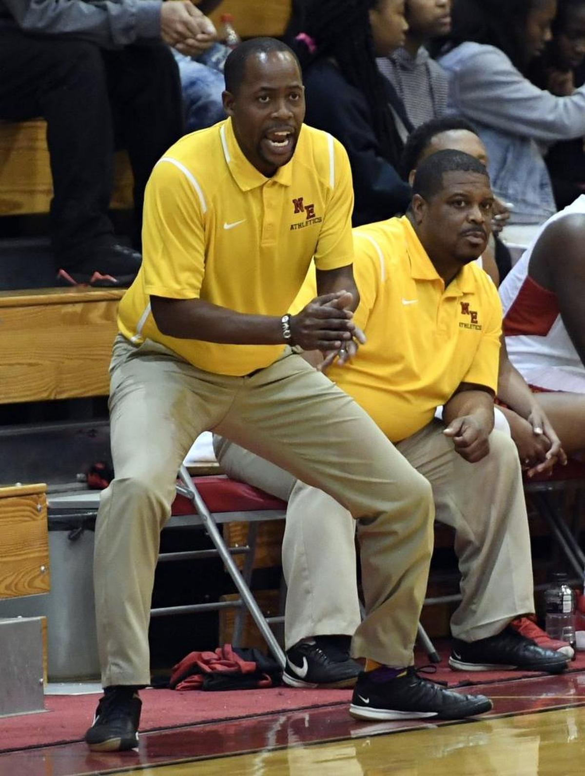 Northeast’s basketball head coach Kevin Grooms coaches his team from the bench in the Copeland Christmas Classic on Wednesday.