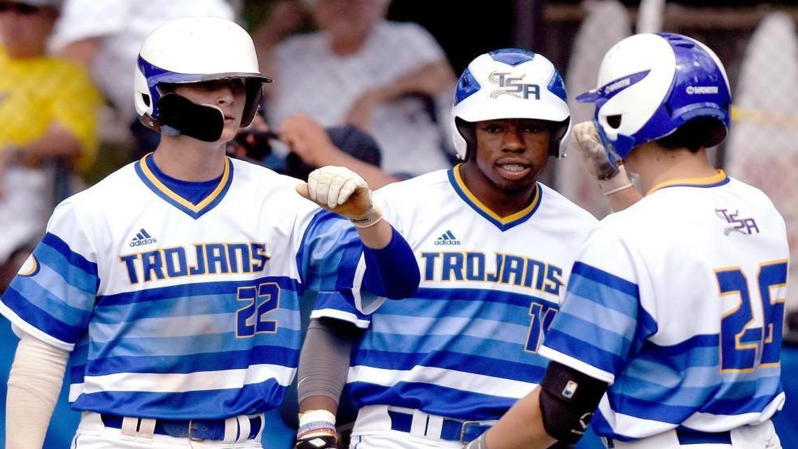 Garrett Houston (22), Logan Simmons and Logan Fink and the Tattnall Square Trojans received a bye in the Class 1A private school playoffs.