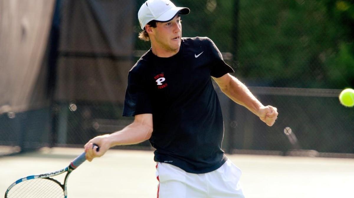 FPD senior Michael Durham returns a forehand during his match against King's Ridge Christian's Adam Volz during their first round GHSA tournament Monday. Durham won the match 6-0, 6-0.