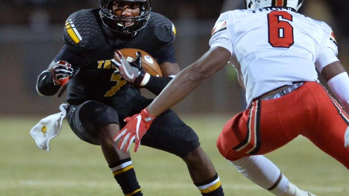 Peach County wide receiver Kearis Jackson cuts back on Greater Atlanta Christian defender Devin Thomas for a short gain in action Friday night.