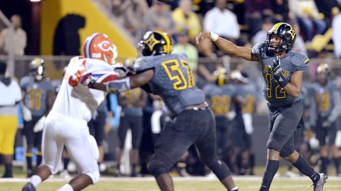 Peach County quarterback Antonio Gilbert (12) and the Trojans host North Murray in the GHSA Class 3A playoffs Friday.