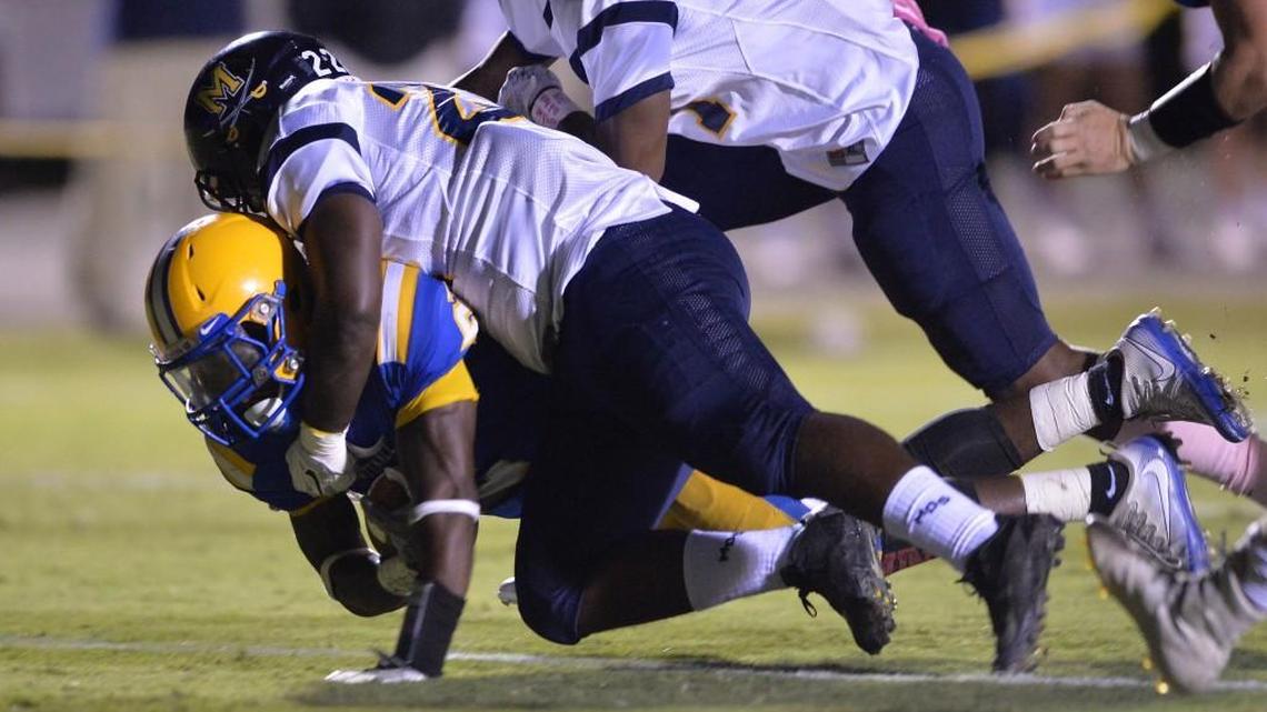 Tattnall running back Antoine Davis dives in to the end zone for another Tattnall touchdown in their match-up with Mount de Sales Friday night.