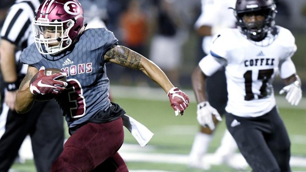 Warner Robins’ Julius Cobbs (3) takes a crossing pattern downfield during the Demons’ game against Coffee on Friday night.