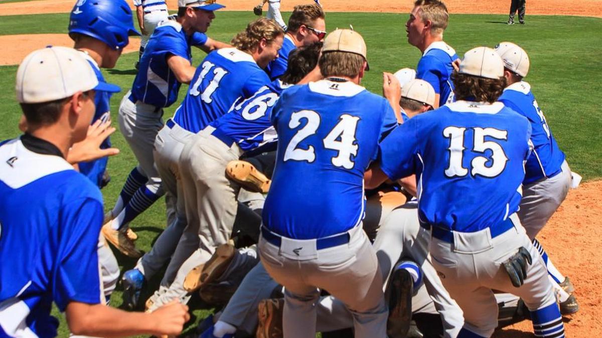 Piedmont celebrates after defeating Terrell Academy and clinching the GISA Class 2A baseball championship for the fourth year in a row.