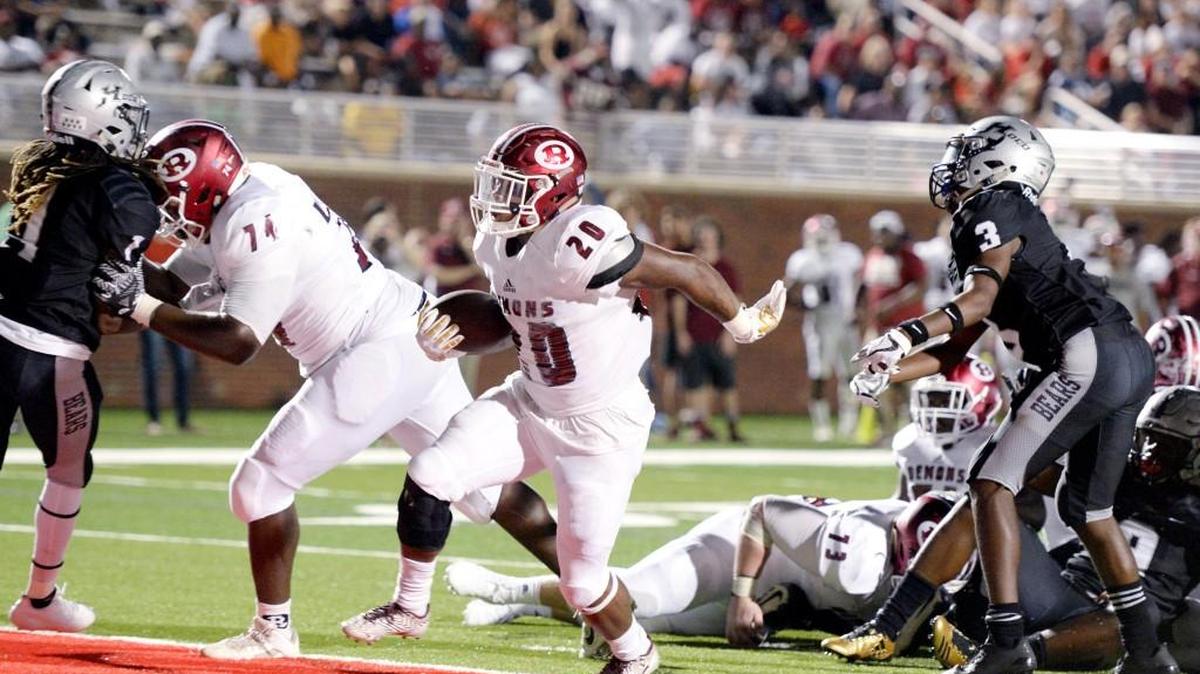 Warner Robins running back Jarius Burnette (20) and the Demons are 4-0 entering their game Friday at West Laurens.