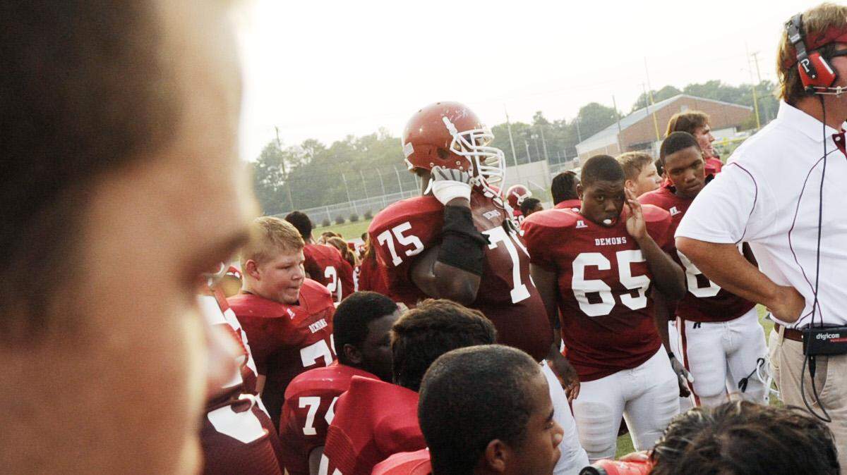 Warner Robins head coach Bryan Way talks with the offense during their scrimmage with Rutland August 16.