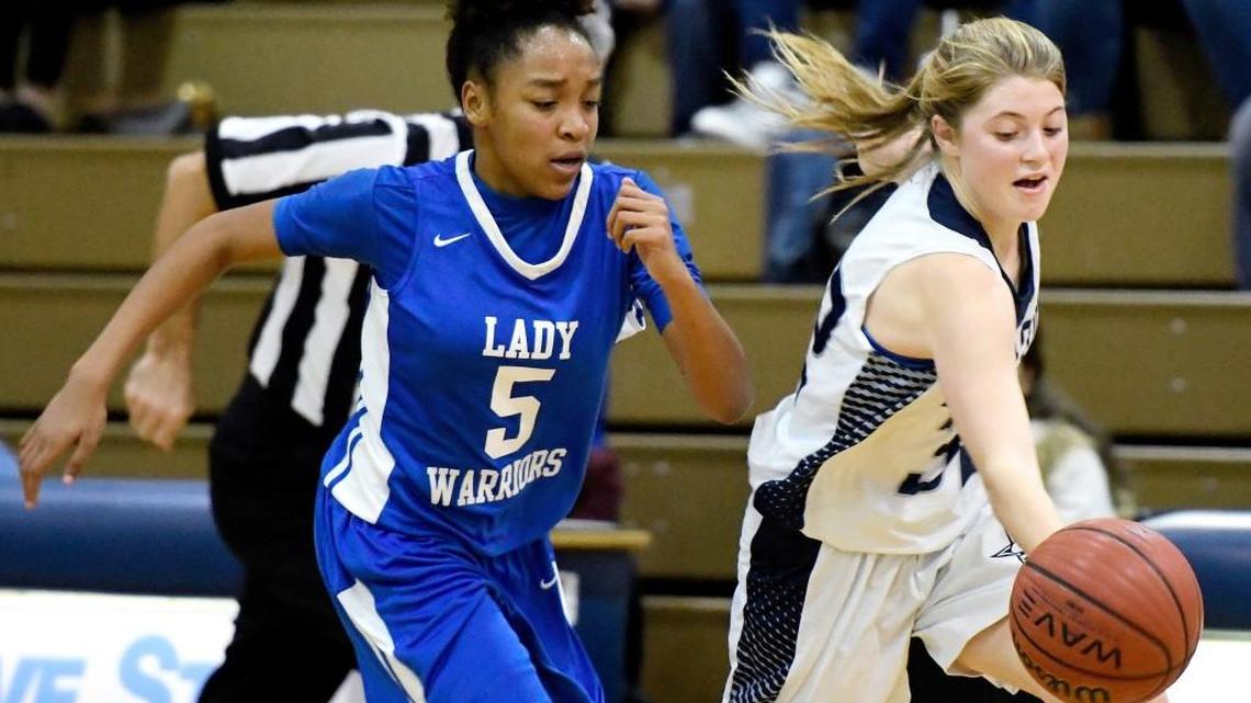 Stratford's Drake Miscall (32) beats Wilkinson County's Ahnila Owens (5) to a loose ball during their game Tuesday night.