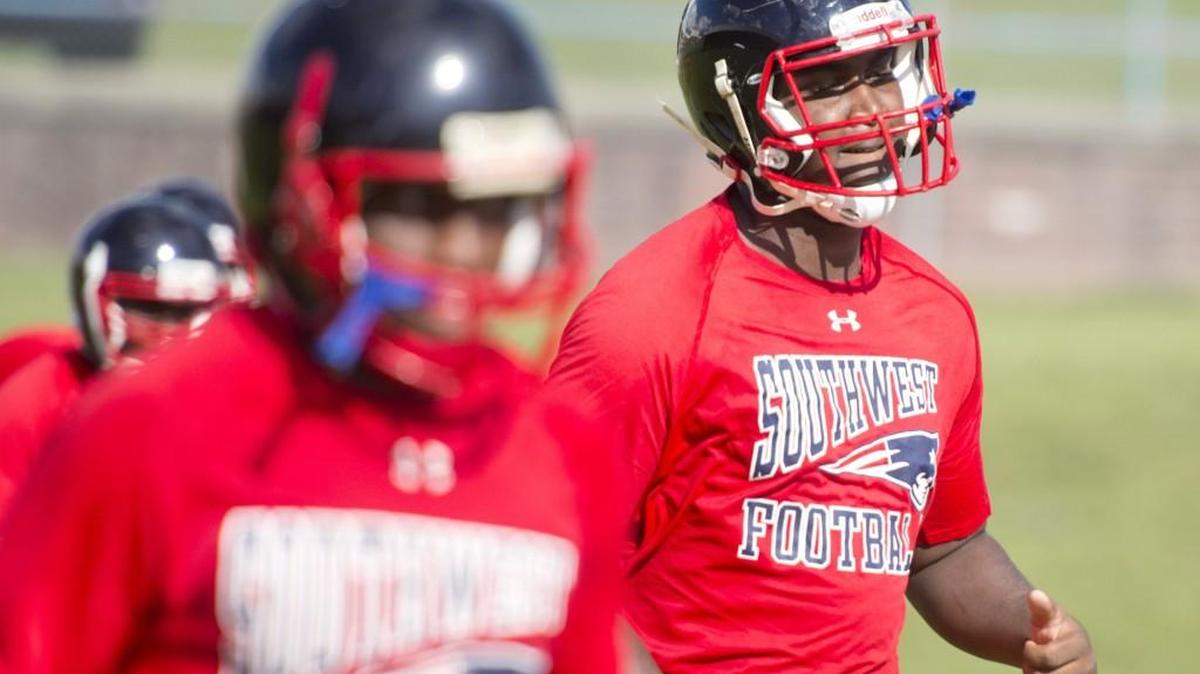 Southwest defensive end BJ Sharpe, right, is one of the top defenders in Middle Georgia.