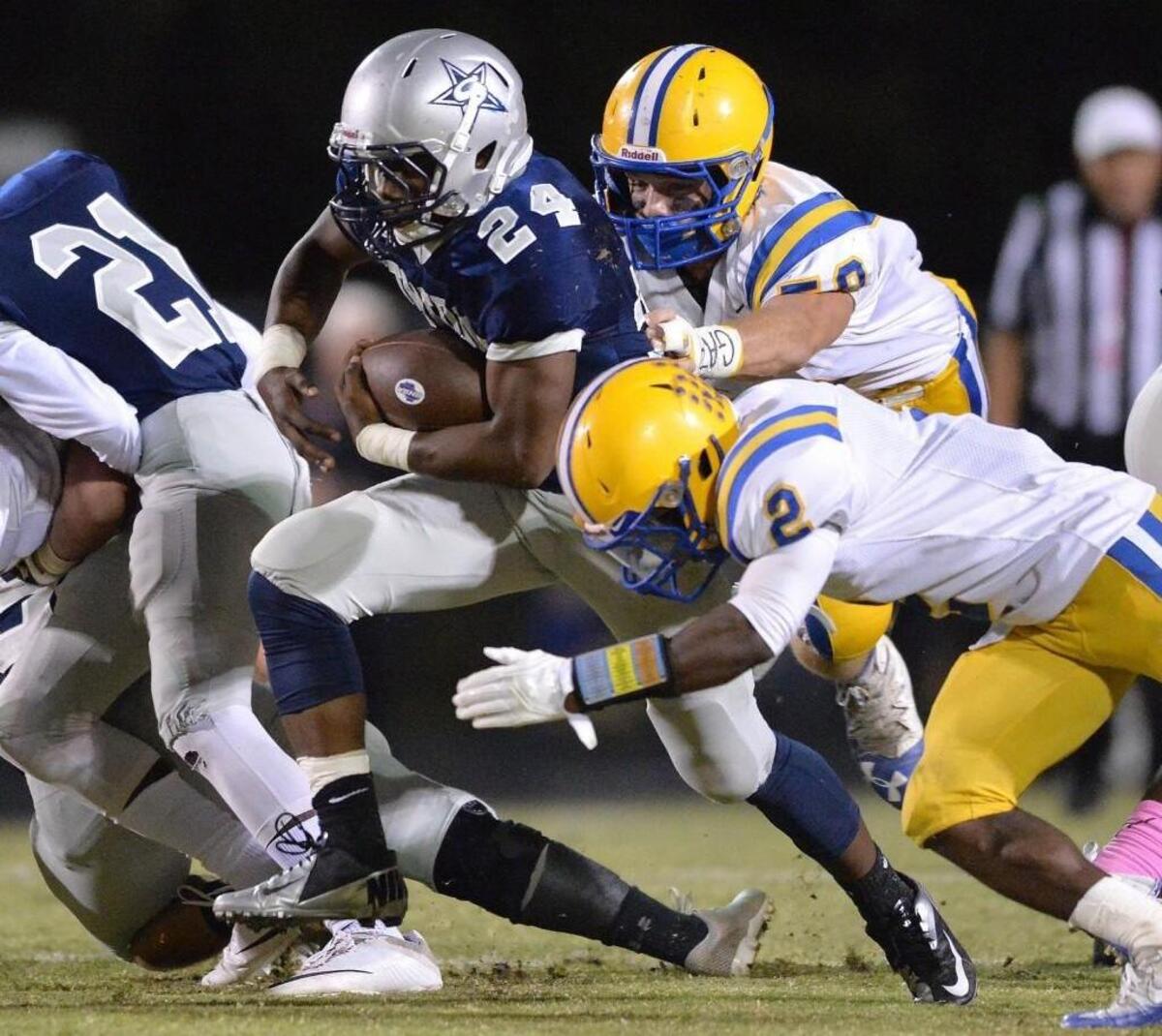 Stratford running back Kasey Sanders (24) breaks through the Tattnall Square line of scrimmage and picks up a first down during their Oct. 28 meeting at Stratford.
