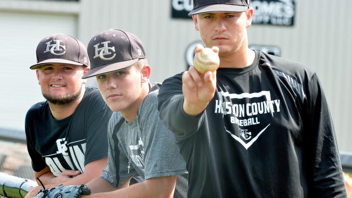 Houston County pitchers Tanner Hall, left, D.L. Hall and Tony Locey carry the Bears into the GHSA Class AAAAA baseball championship series.