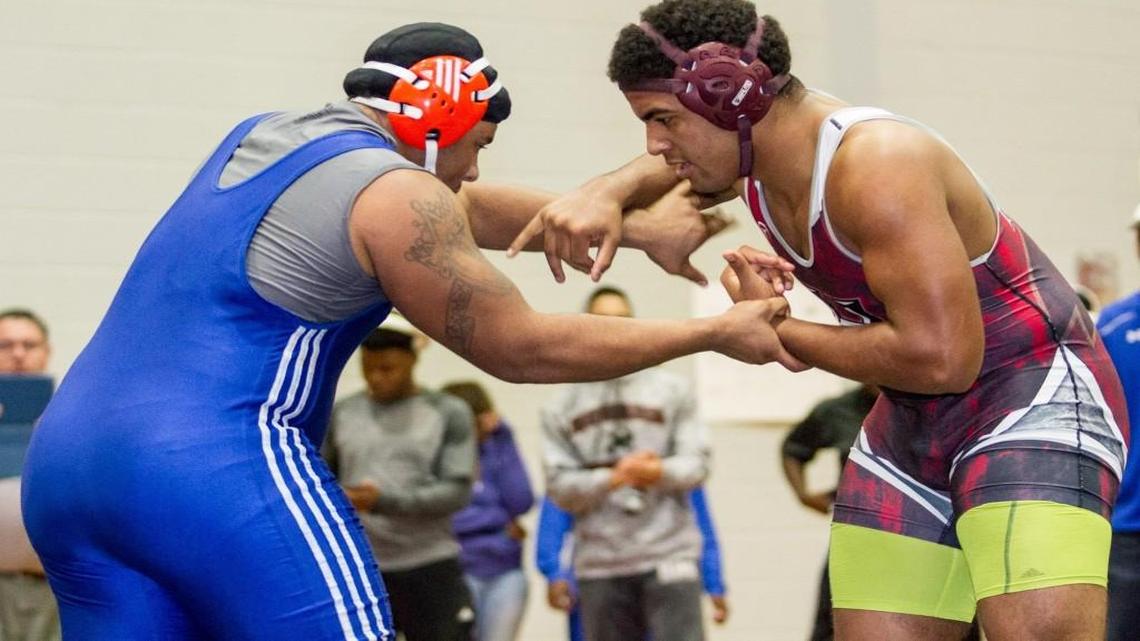 Howard’s Gabe Howard, right, and Central’s Javis Johnson will compete this weekend at the GHSA traditional wrestling championships at the Macon Coliseum.