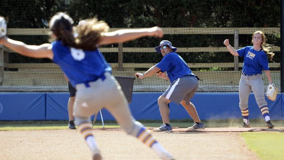 Tattnall Square head coach Joey Hiller, center, and his team open play in the GHSA Class 1A private school playoffs.